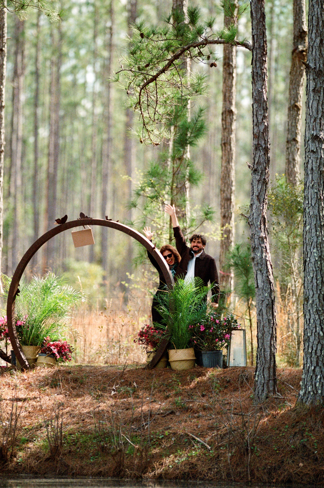 Ricardo and Jhoan waving after their proposal